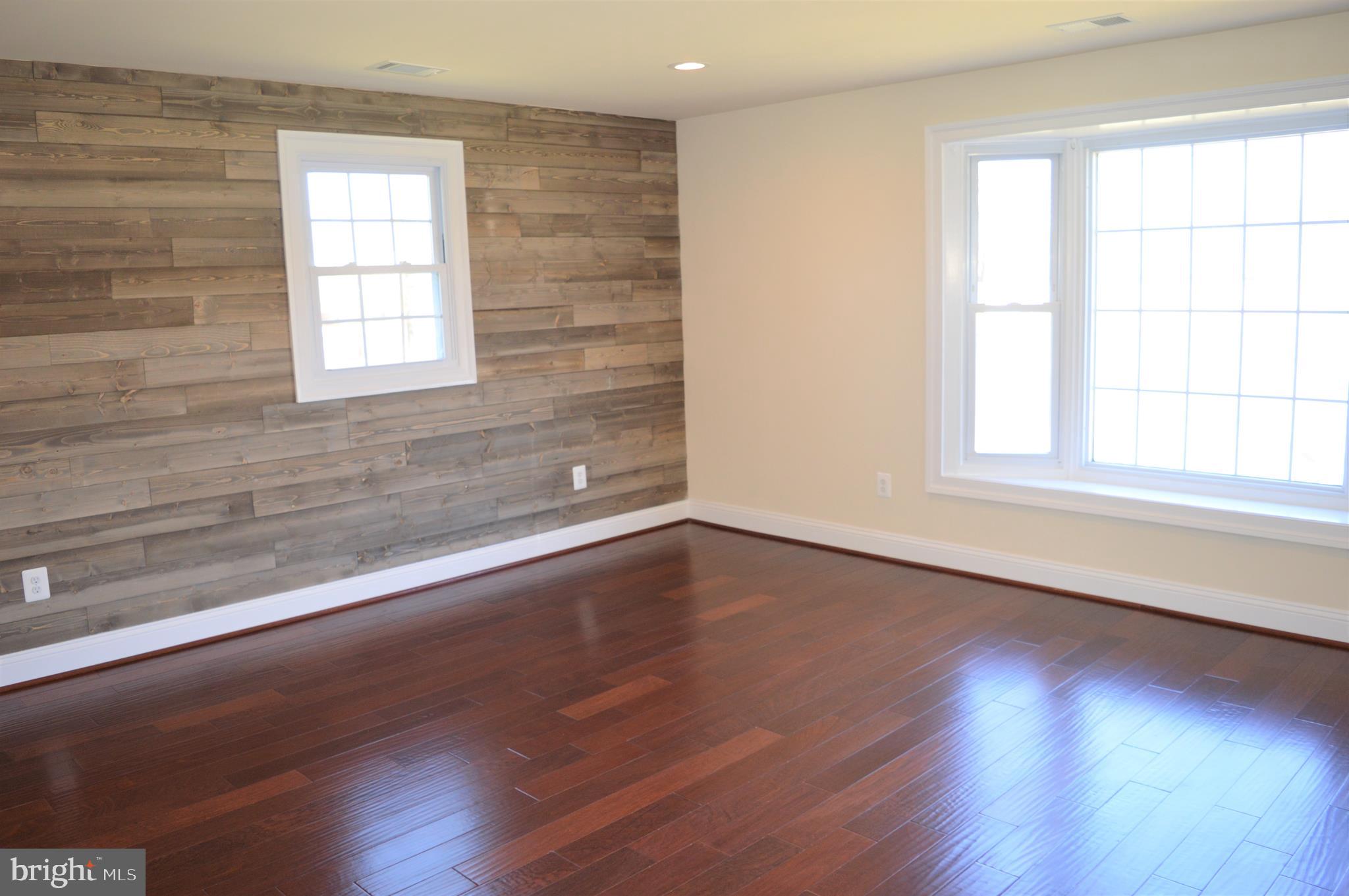 9250 Piscataway Road Clinton, MD 20735 - Photo 53 of 101 Family room with hardwood floor