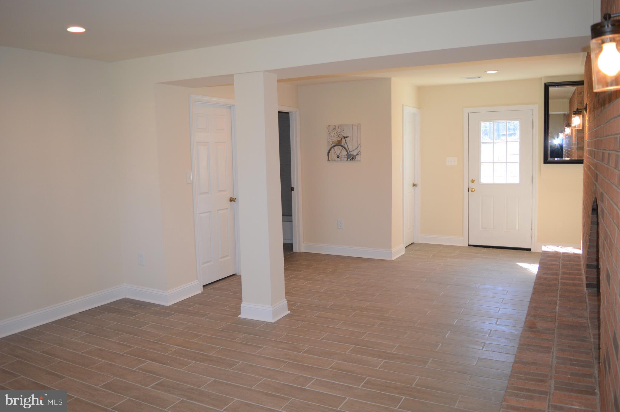 9250 Piscataway Road Clinton, MD 20735 - Photo 82 of 101 Large Rec room with rear entrance