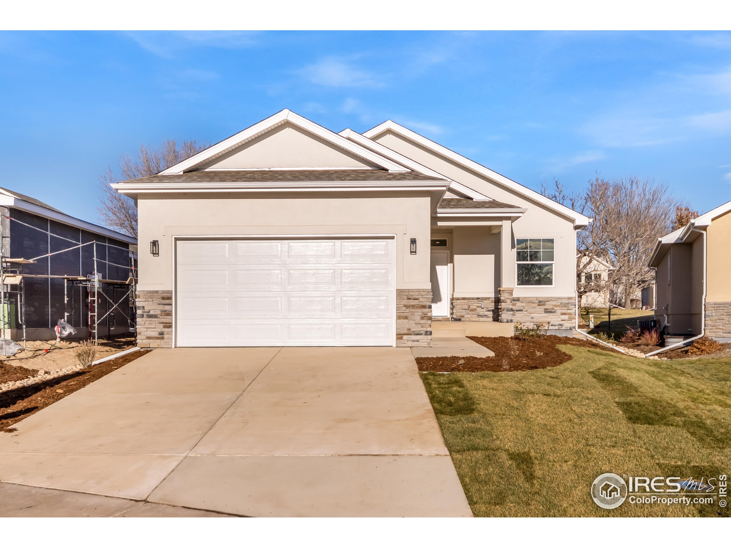 a very nice looking house with a large window