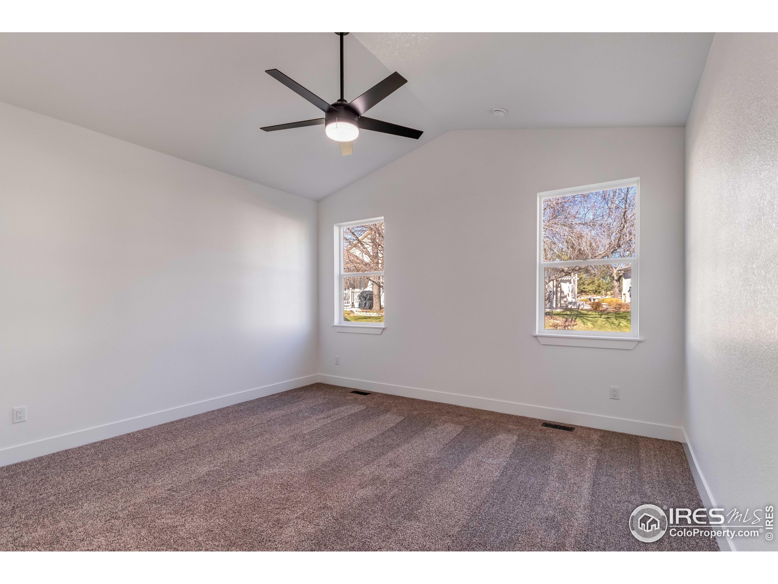 1230 Swainson Road Eaton, CO 80615 - Photo 19 of 35 a view of an empty room with a window