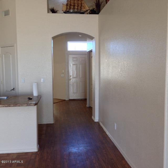 3228 West Maldonado Road Phoenix, AZ 85041 - Photo 6 of 6 a view of a livingroom with a fireplace