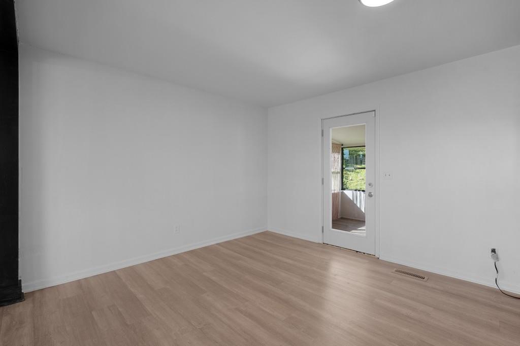 1717 East Rebel Road Rossville, GA 30741 - Photo 14 of 36 an empty room with windows