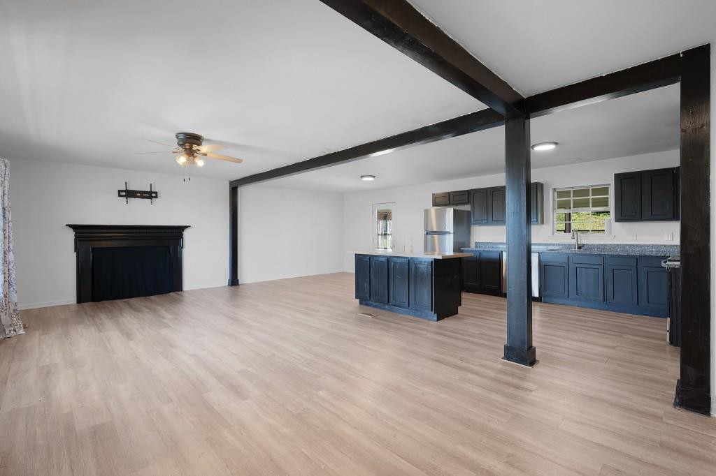 1717 East Rebel Road Rossville, GA 30741 - Photo 15 of 36 a view of kitchen with sink and cabinet with wooden floor