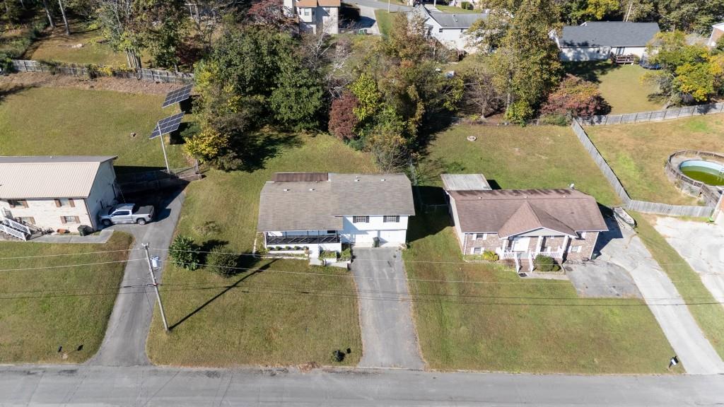 1717 East Rebel Road Rossville, GA 30741 - Photo 2 of 36 an aerial view of a house with swimming pool and outdoor seating