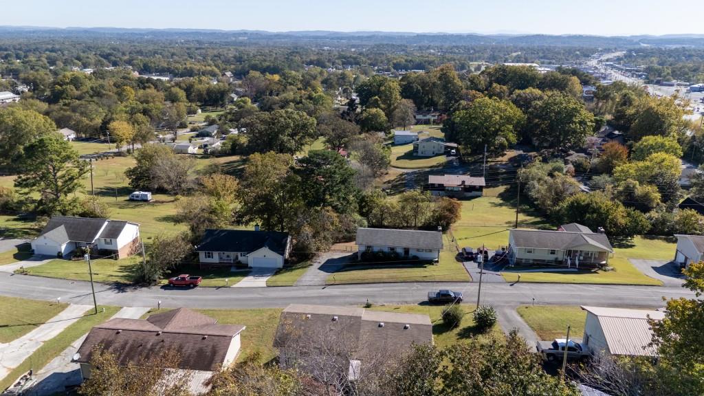 1717 East Rebel Road Rossville, GA 30741 - Photo 29 of 36 a view of a house with a yard and pool