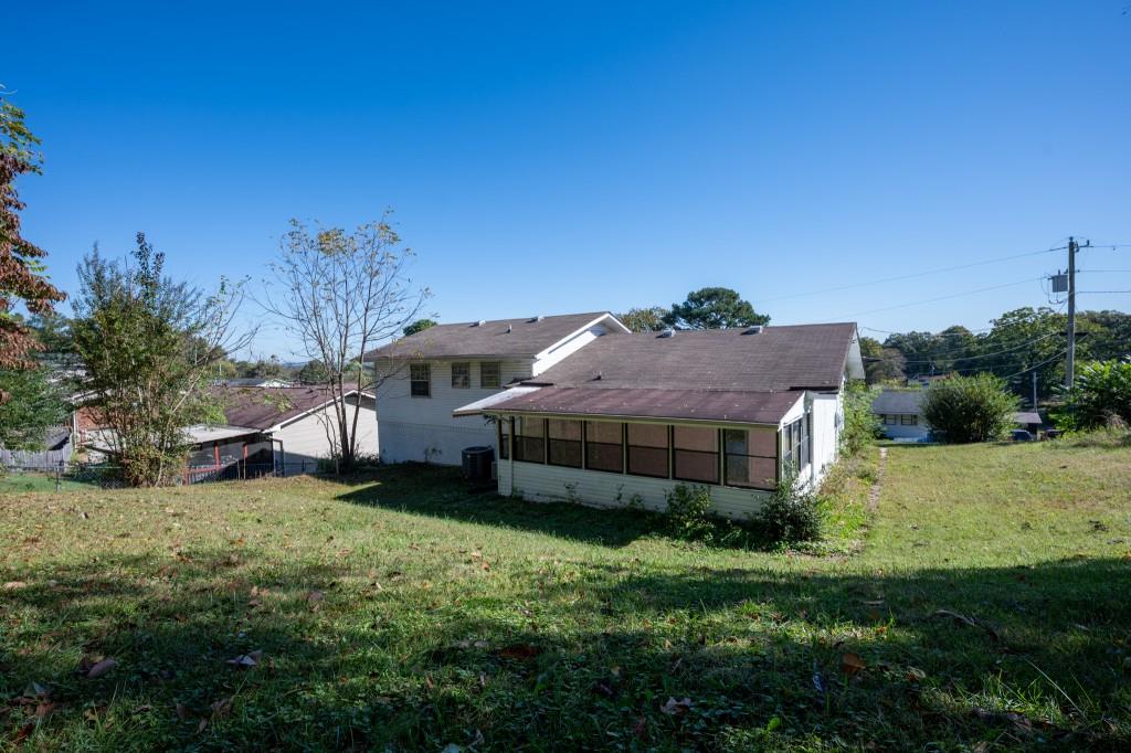 1717 East Rebel Road Rossville, GA 30741 - Photo 30 of 36 a aerial view of a house with a yard and a fountain