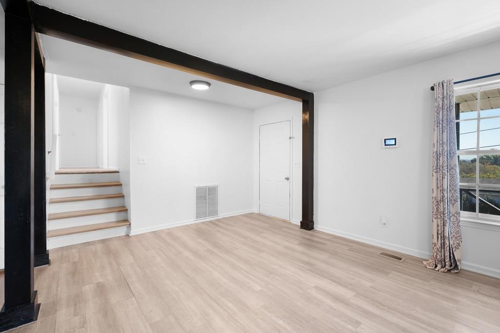 1717 East Rebel Road Rossville, GA 30741 - Photo 7 of 36 a view of empty room with wooden floor