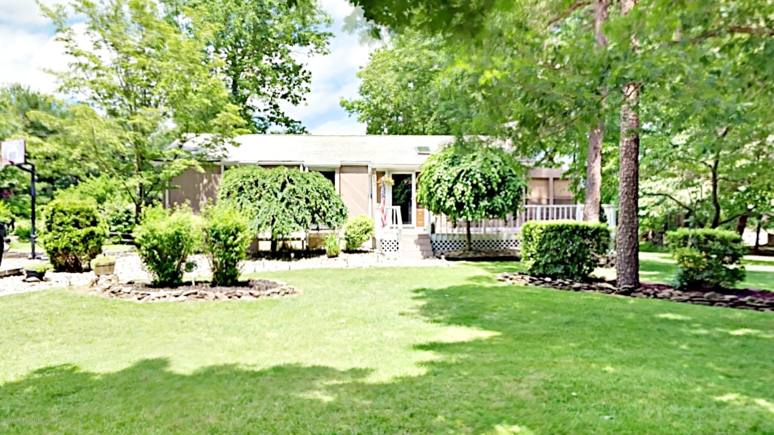 890 Anderson Road Jackson, NJ 08527 - Photo 11 of 17 a view of a house with a yard