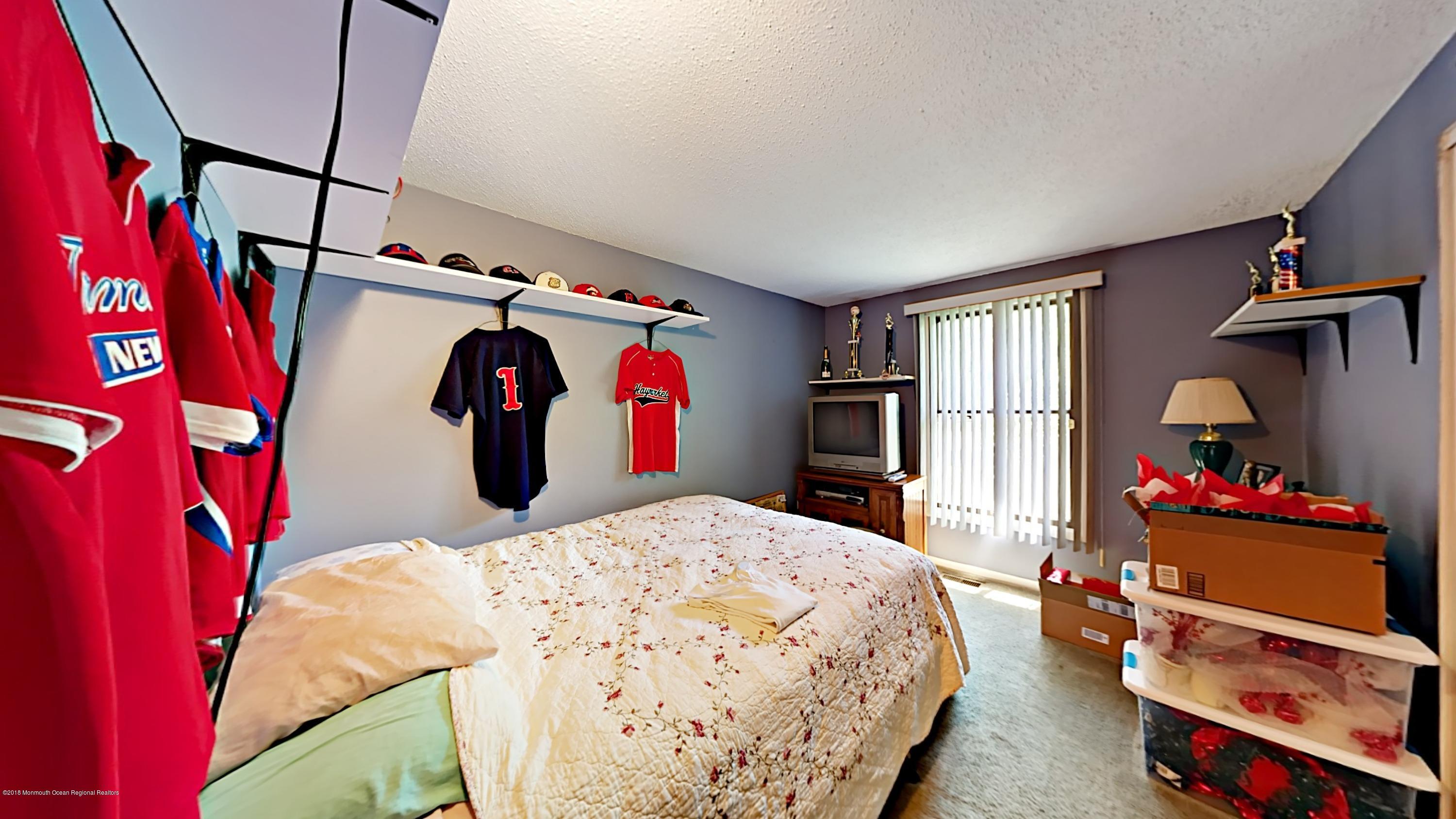 890 Anderson Road Jackson, NJ 08527 - Photo 9 of 17 a bed room with a bed and a bed