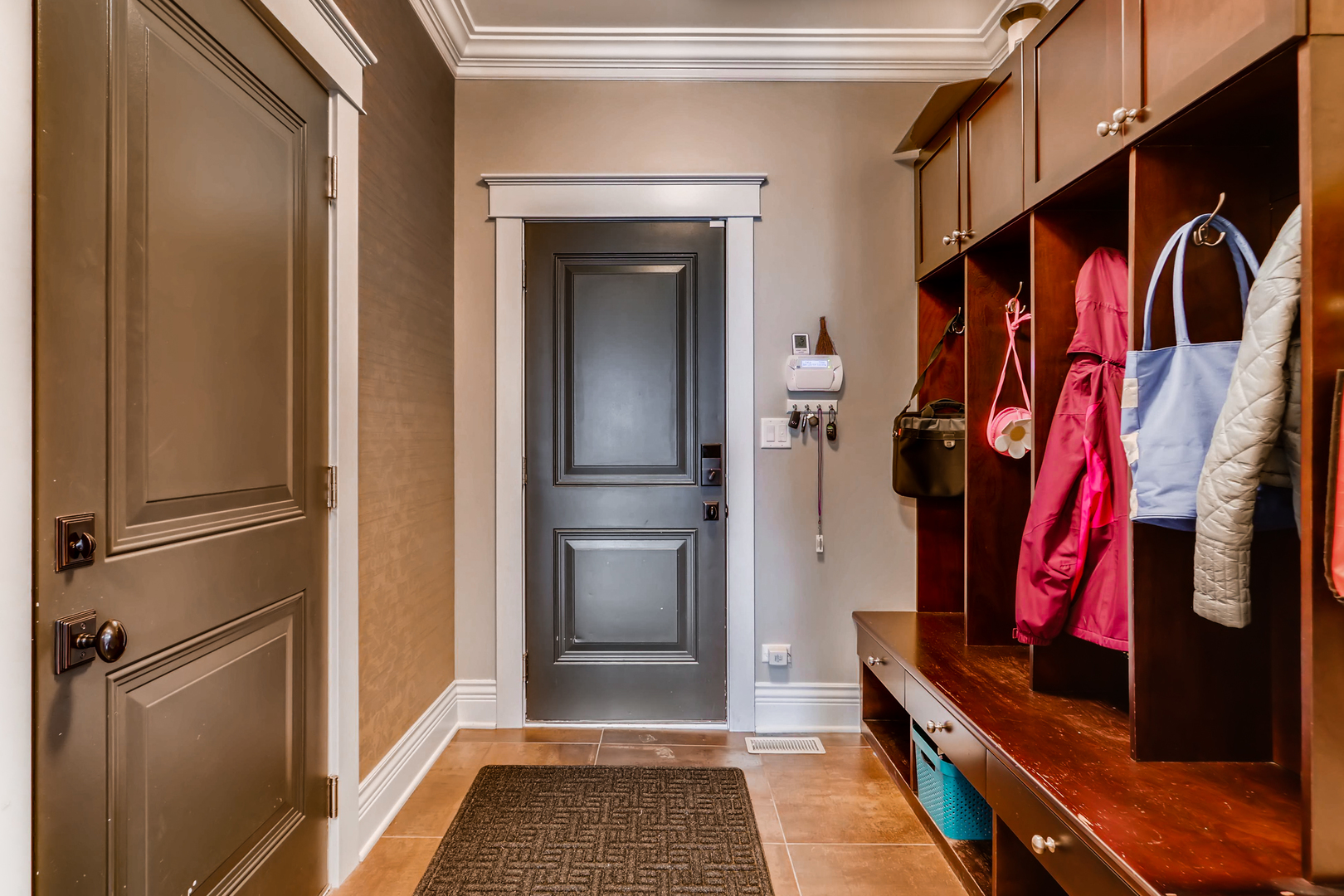 369 Downing Road Riverside, IL 60546 - Photo 11 of 46 a view of walk in closet with clothes and shoes