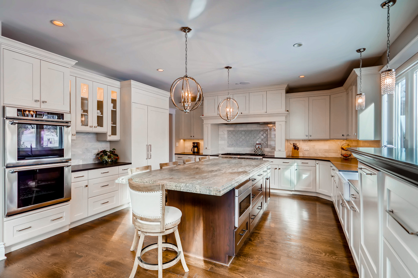 369 Downing Road Riverside, IL 60546 - Photo 15 of 46 a kitchen with stainless steel appliances granite countertop a stove oven and a sink with cabinets
