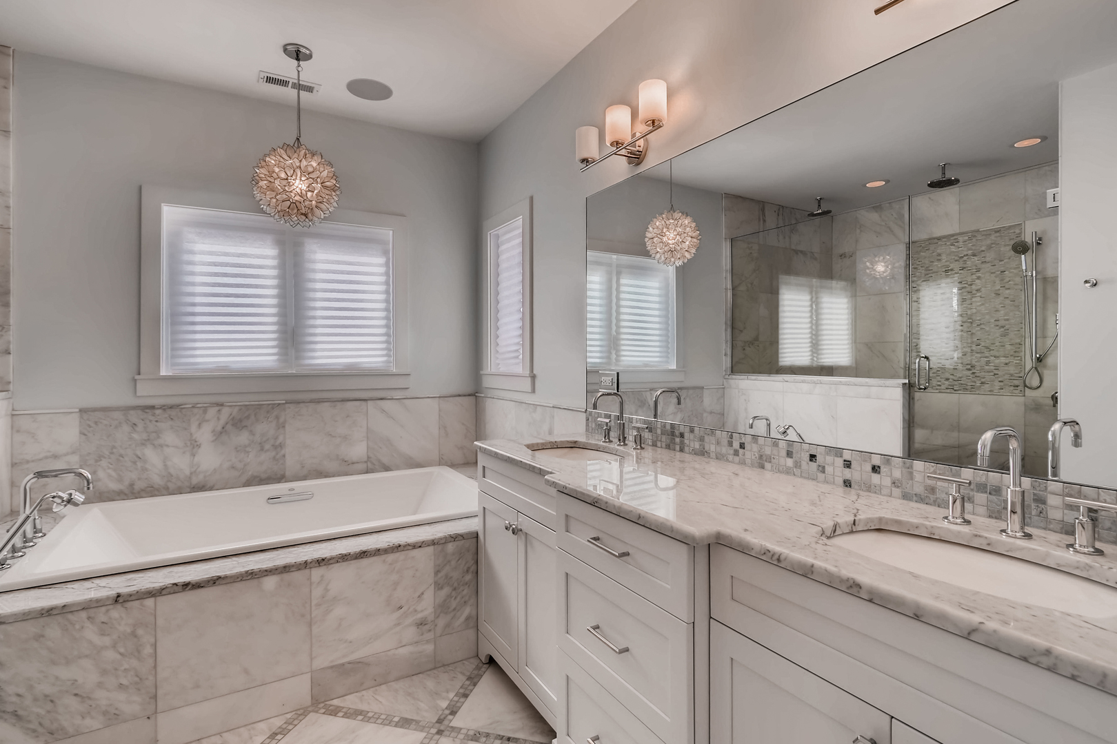 369 Downing Road Riverside, IL 60546 - Photo 22 of 46 a bathroom with a granite countertop sink mirror and bathtub