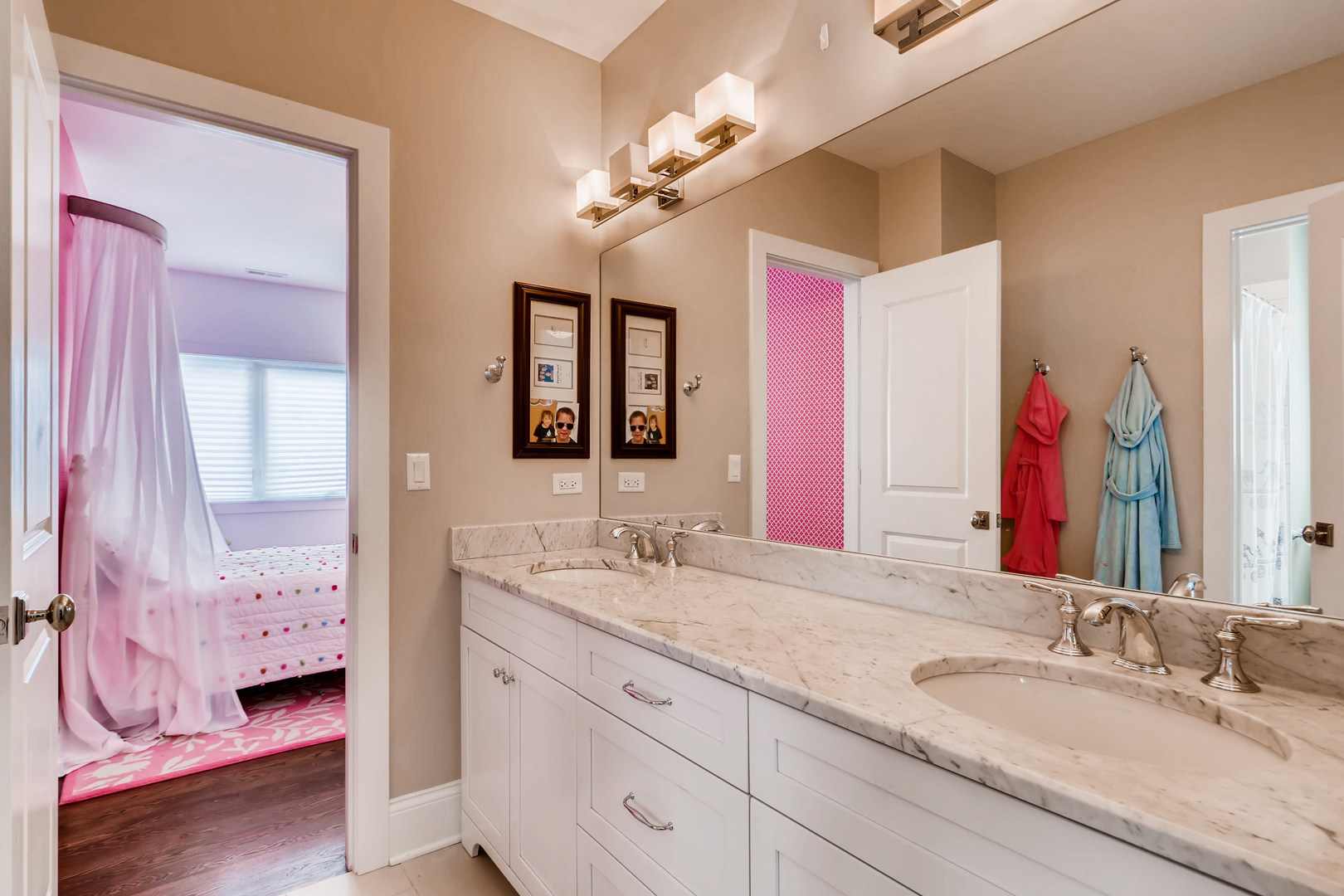 369 Downing Road Riverside, IL 60546 - Photo 27 of 46 a bathroom with a granite countertop double vanity sink a mirror and a shower