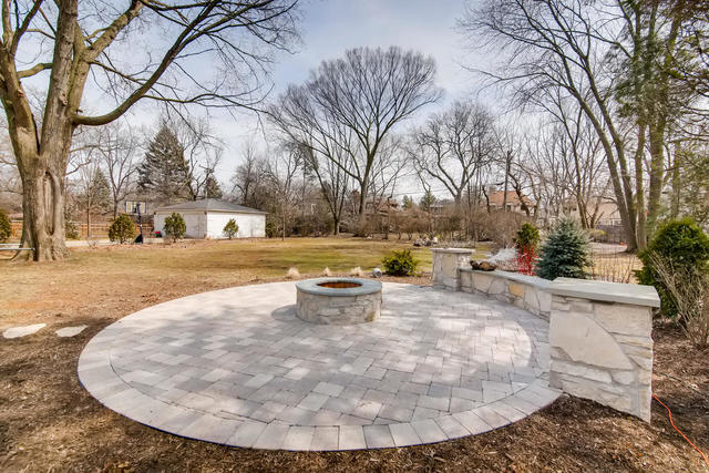 369 Downing Road Riverside, IL 60546 - Photo 41 of 46 a view of a swimming pool with a patio