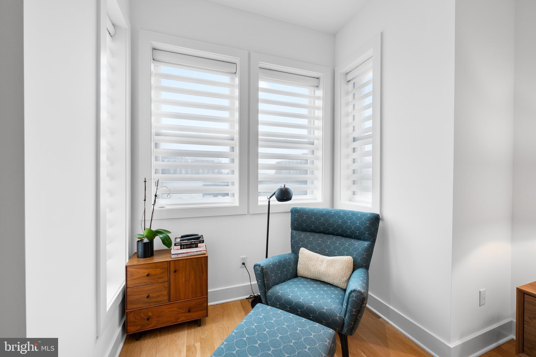 1806 9th Street Northwest, Unit 2 Washington, DC 20001 - Photo 17 of 40 a living room with furniture and a window