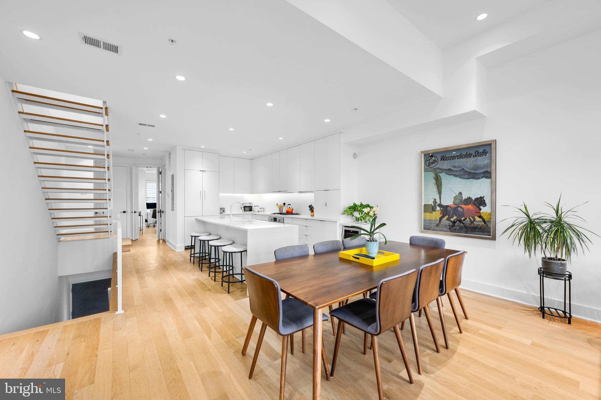 1806 9th Street Northwest, Unit 2 Washington, DC 20001 - Photo 2 of 40 a view of a dining room with furniture and wooden floor