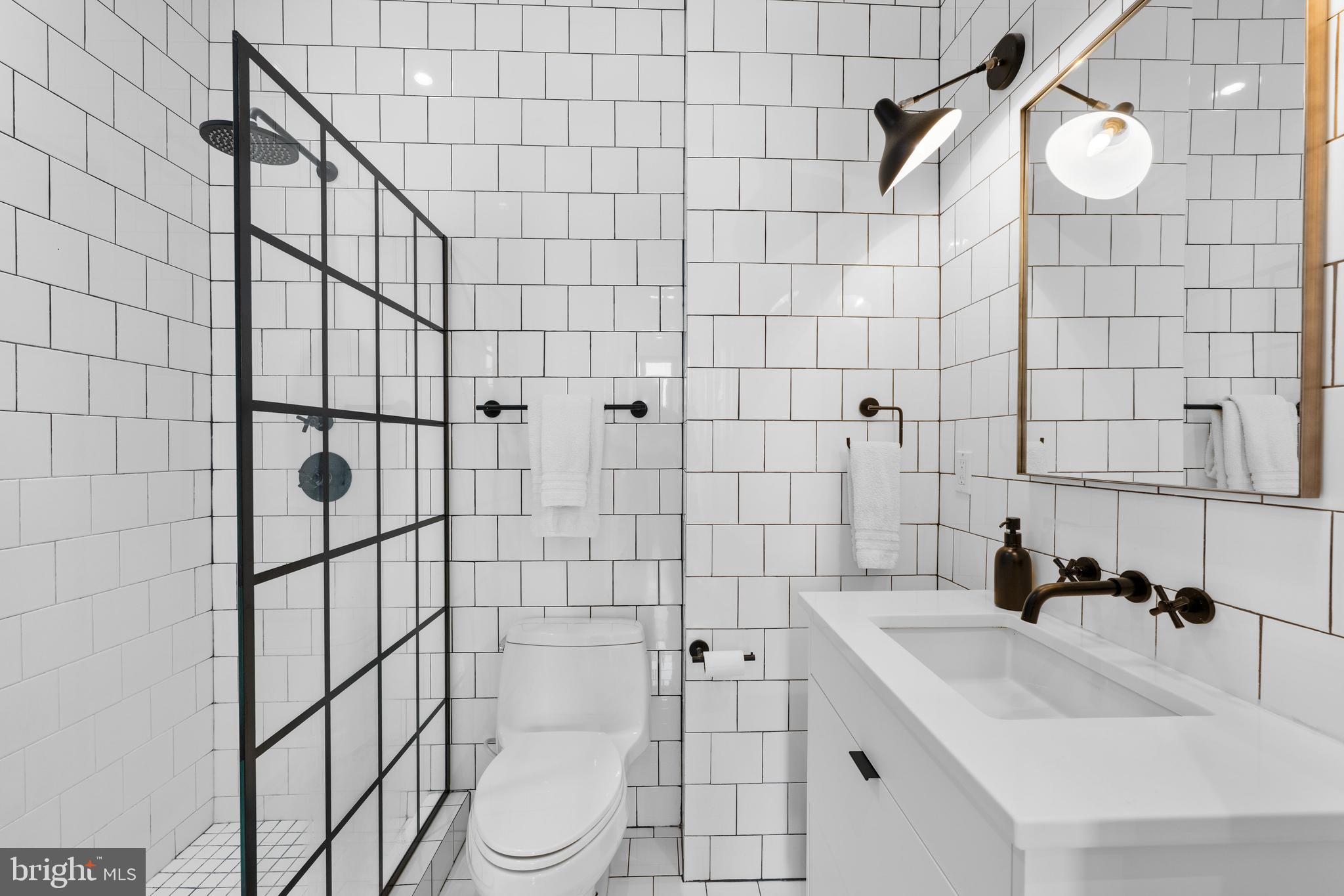 1806 9th Street Northwest, Unit 2 Washington, DC 20001 - Photo 24 of 40 a bathroom with a shower