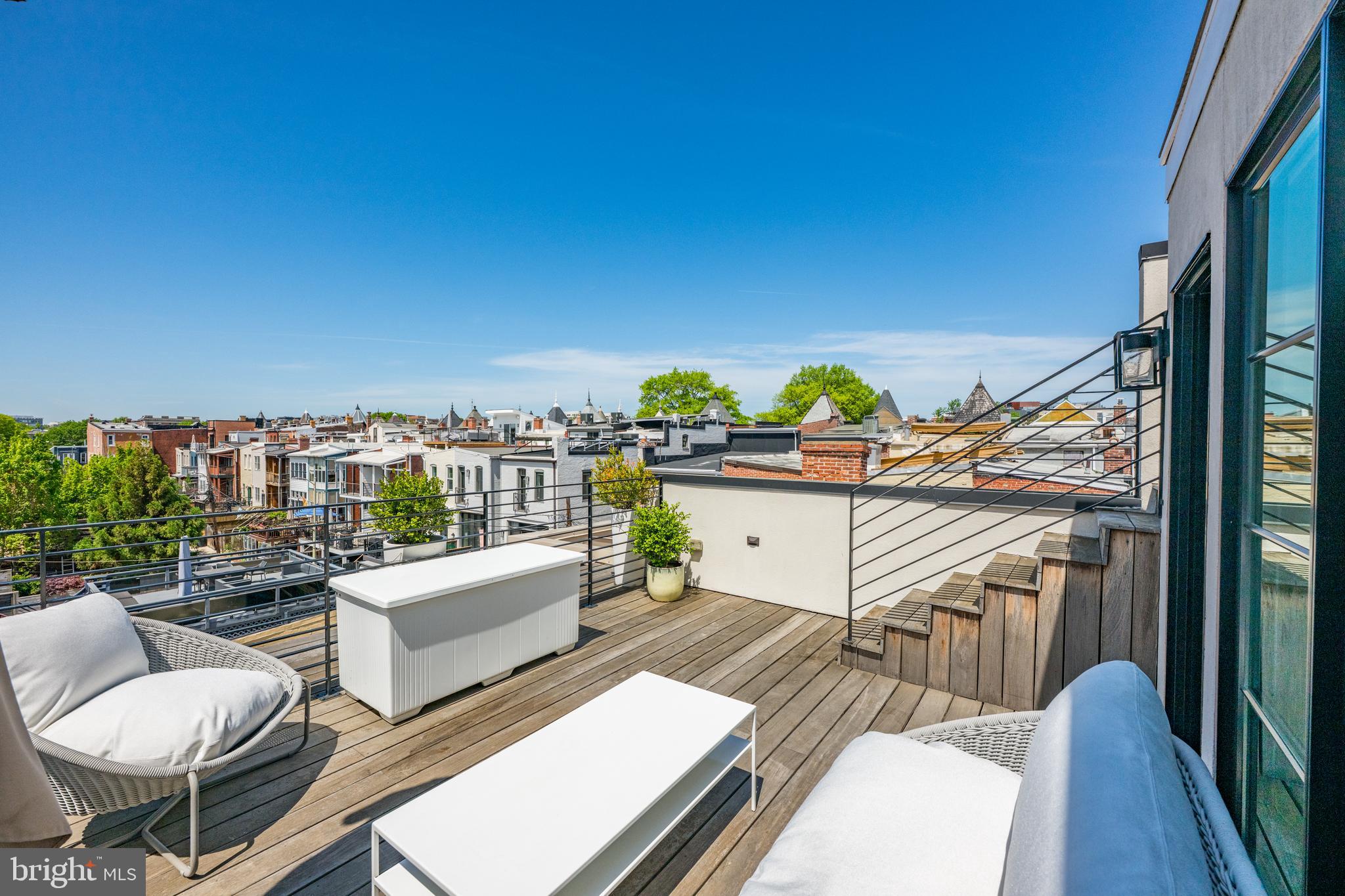 1806 9th Street Northwest, Unit 2 Washington, DC 20001 - Photo 27 of 40 a balcony with table and chairs