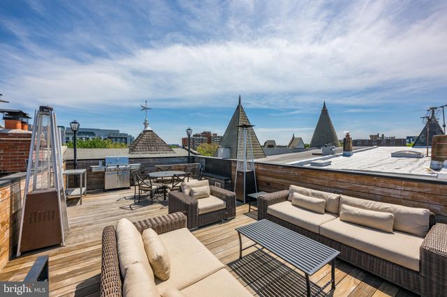 a view of a terrace with seating area