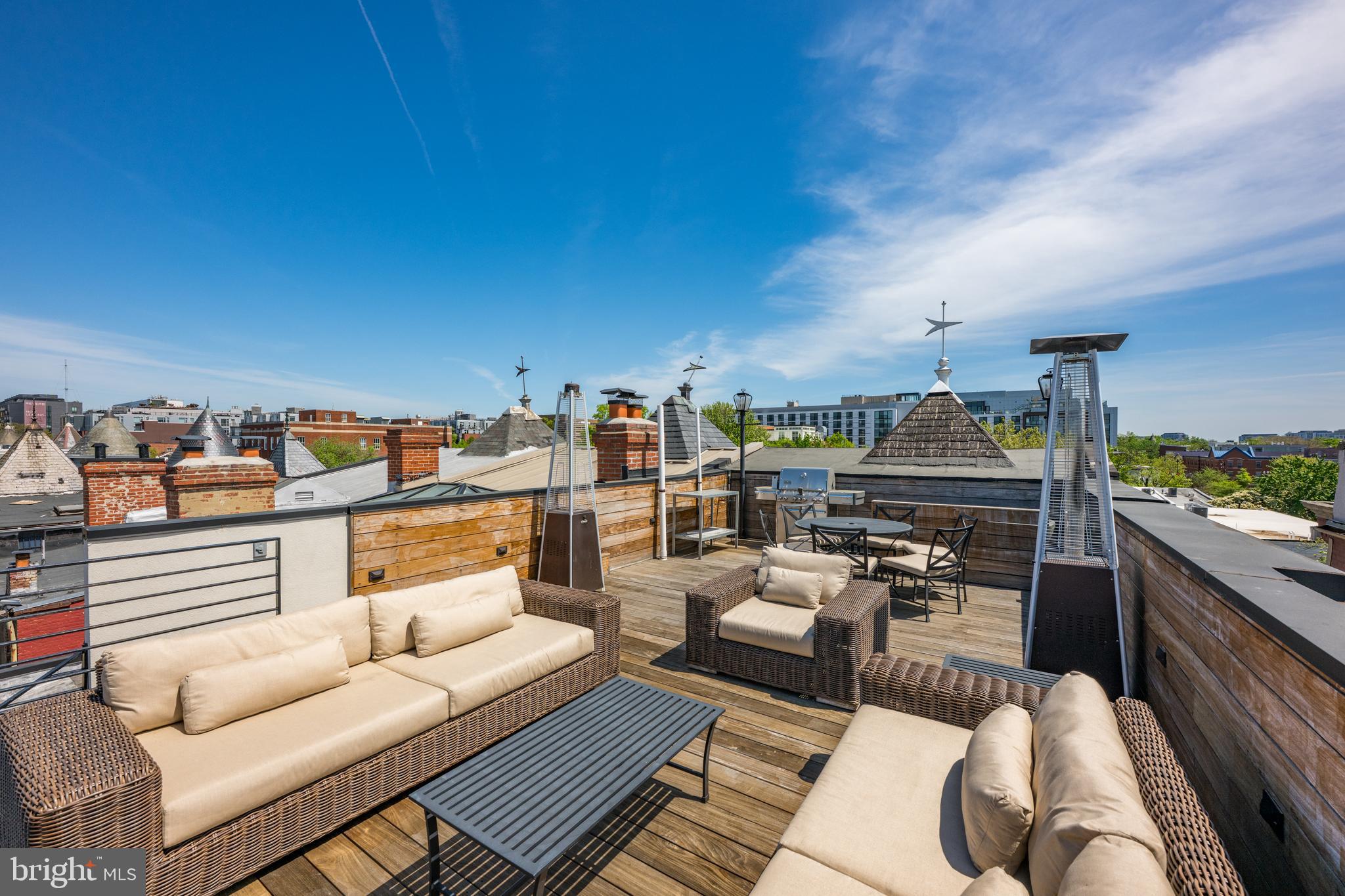 1806 9th Street Northwest, Unit 2 Washington, DC 20001 - Photo 31 of 40 a living room with furniture and a kitchen view