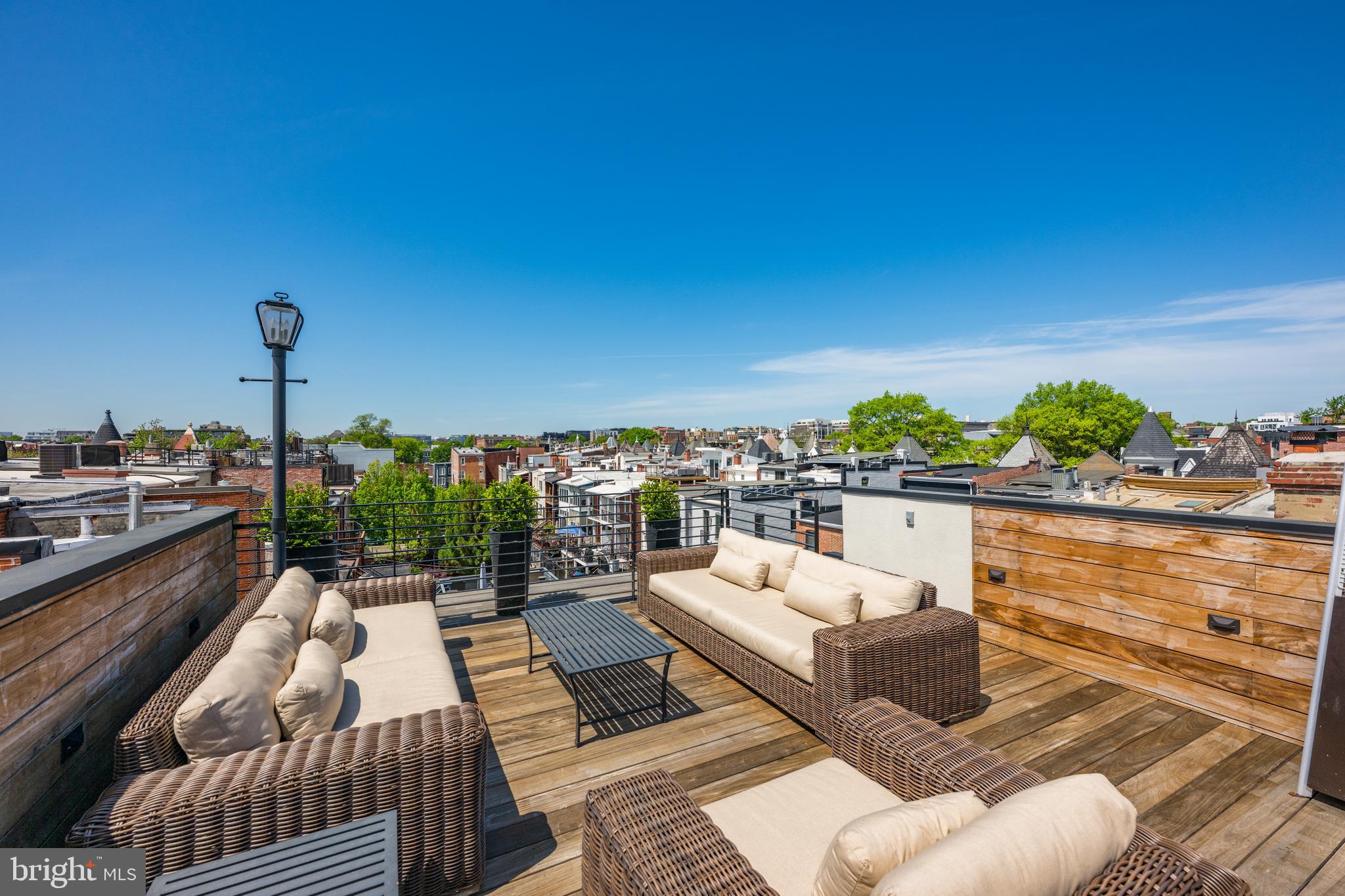 1806 9th Street Northwest, Unit 2 Washington, DC 20001 - Photo 34 of 40 a view of roof deck with seating area and city view