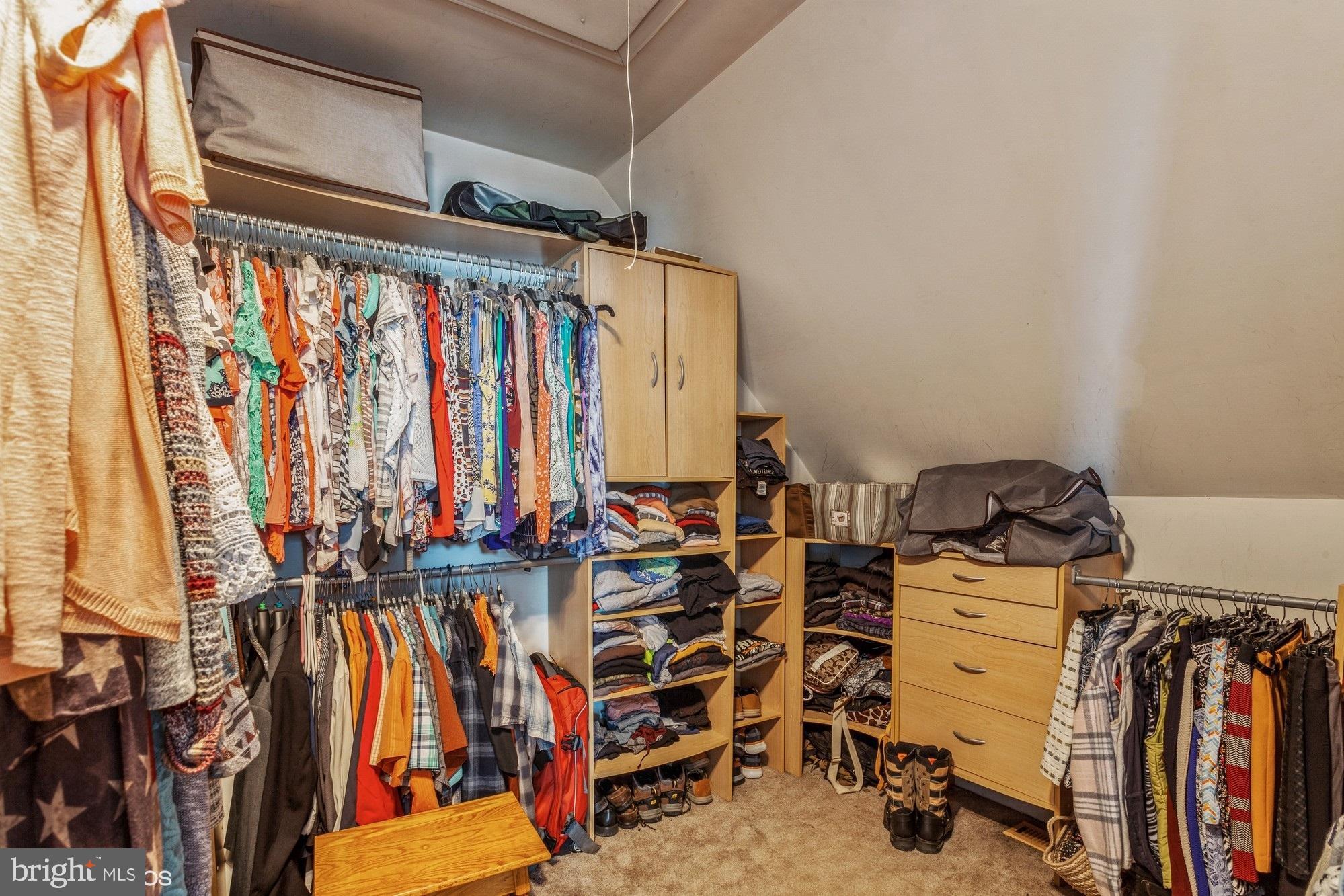 2425 Golupski Road Essex, MD 21221 - Photo 26 of 48 a view of walk in closet with clothes and shoes