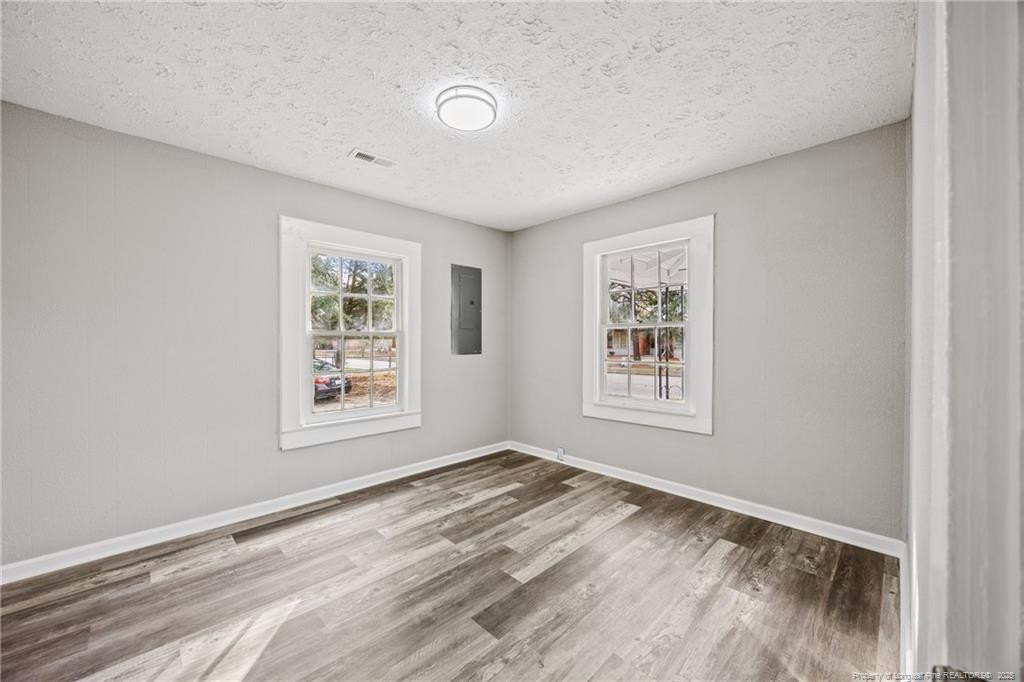 1601 Camden Road Fayetteville, NC 28306 - Photo 11 of 31 a view of an empty room with a window