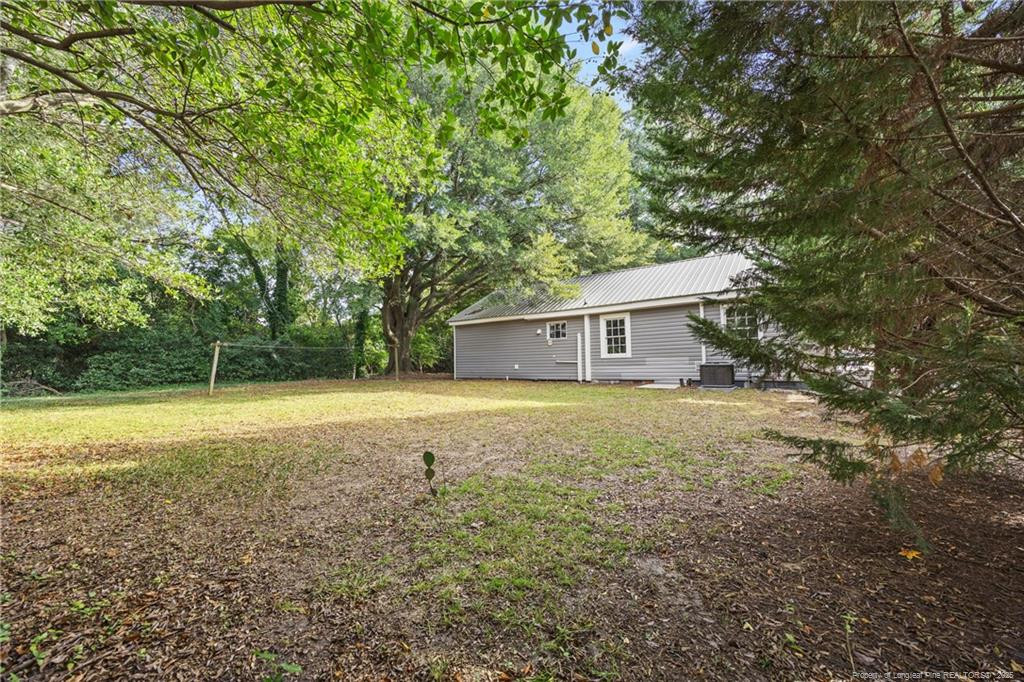 1601 Camden Road Fayetteville, NC 28306 - Photo 26 of 31 a house view with a backyard space