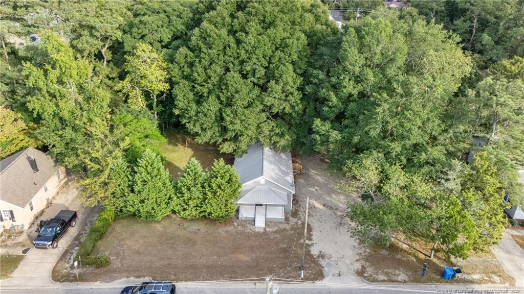 1601 Camden Road Fayetteville, NC 28306 - Photo 29 of 31 a backyard of a house with lots of green space