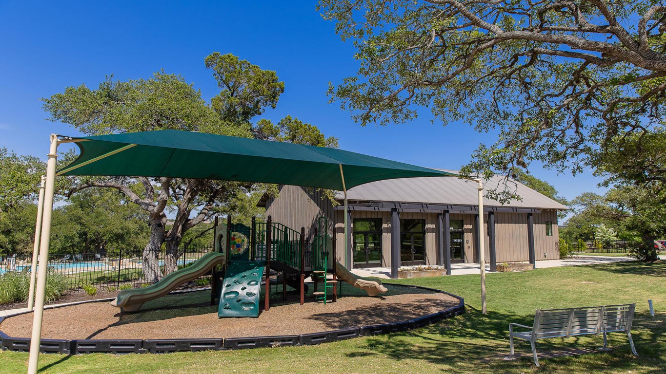 290 Leaning Rock Ridge Austin, TX 78737 - Photo 14 of 14 a view of a house with backyard porch and sitting area
