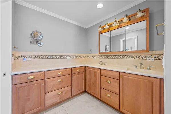 a utility room with cabinets
