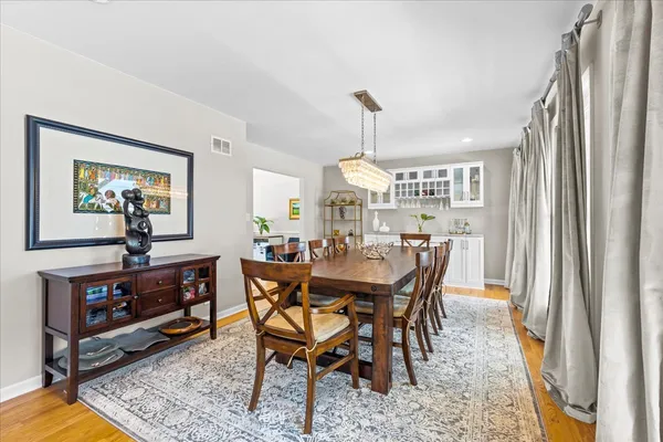 a view of a dining room with furniture