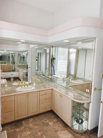 a view of a house with a yard and a porch