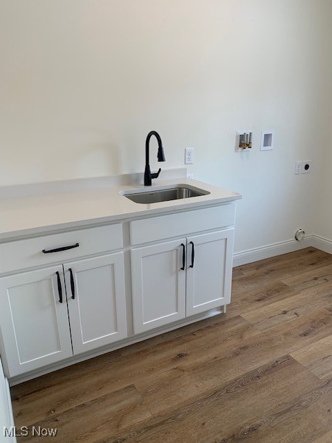 1775 Green Road Madison, OH 44057 - Photo 17 of 46 abundant laundry room with vanity, quartz counter top, closet and exterior door