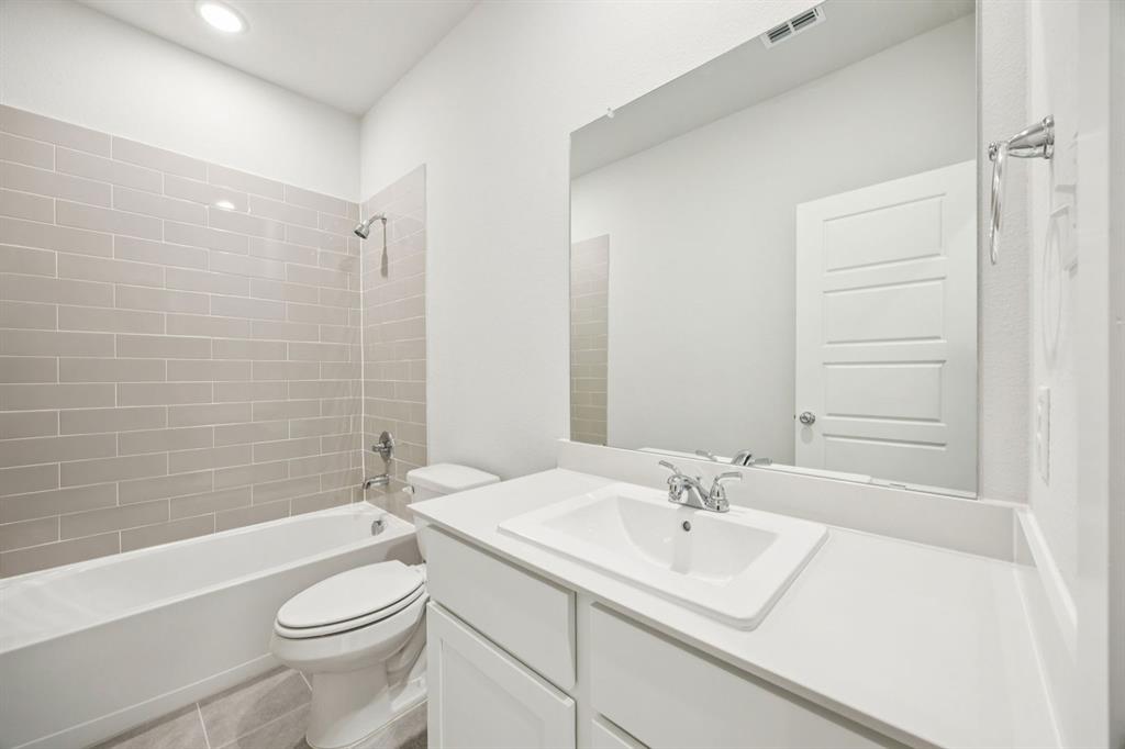 5803 Rushing River Way McKinney, TX 75071 - Photo 29 of 34 Bathroom in the Masters home plan by Trophy Signature Homes – REPRESENTATIVE PHOTO