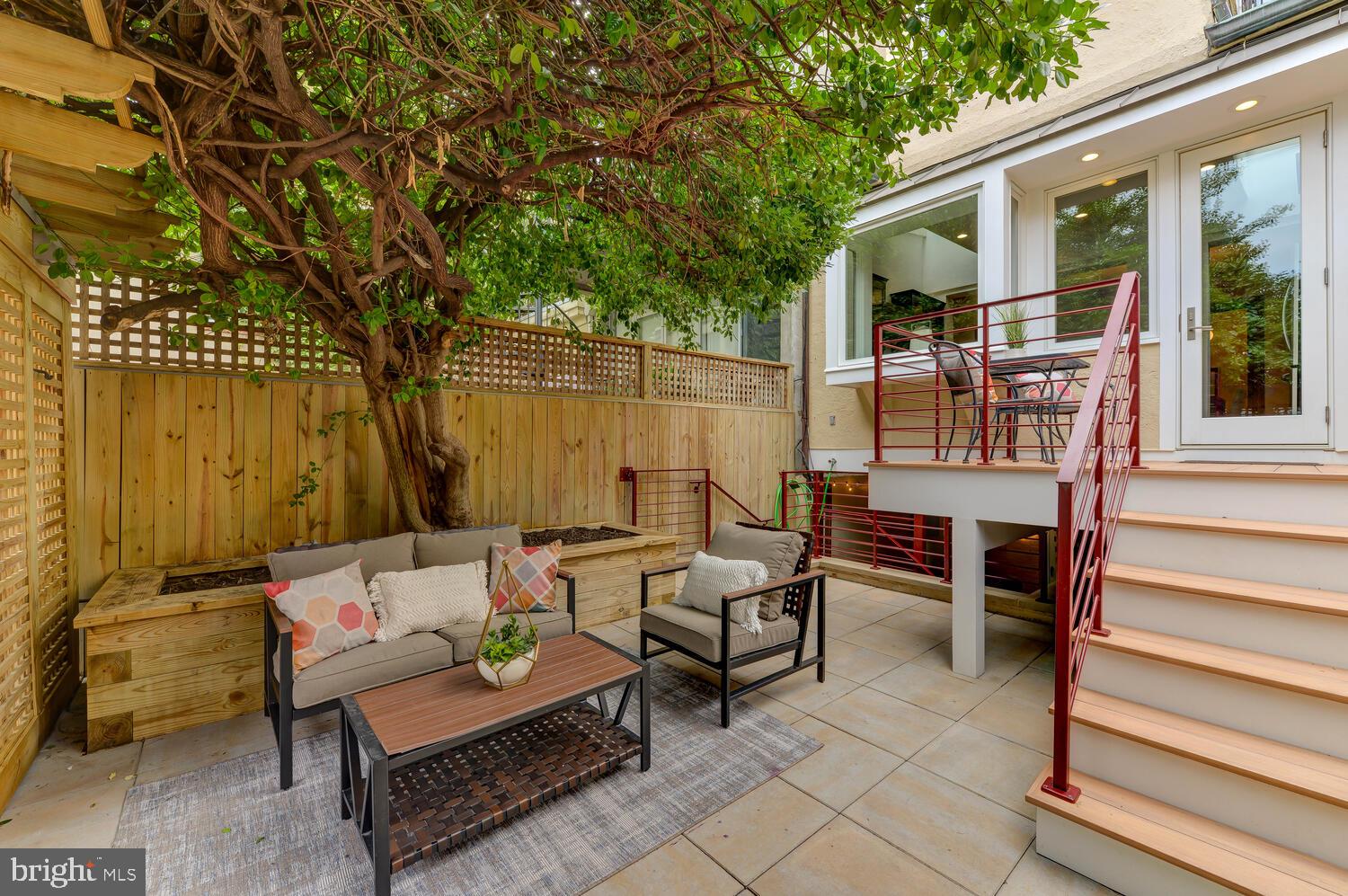 1607 S Street Northwest Washington, DC 20009 - Photo 23 of 75 Lower level area on beautifully hardscaped patio