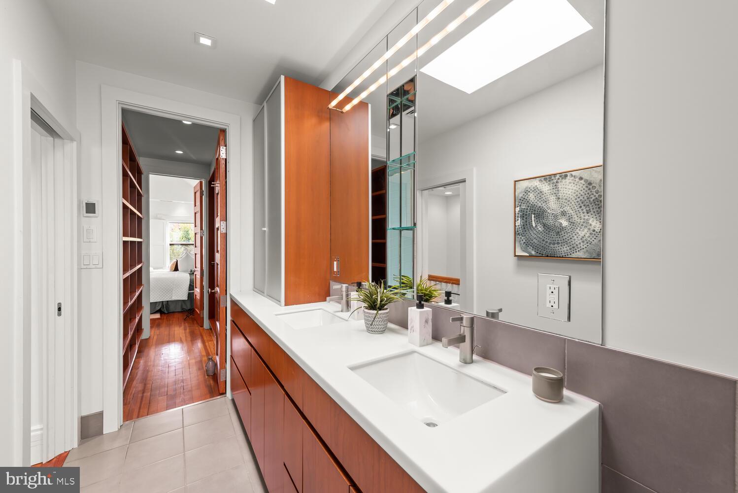 1607 S Street Northwest Washington, DC 20009 - Photo 51 of 75 En-suite bathroom with two sinks