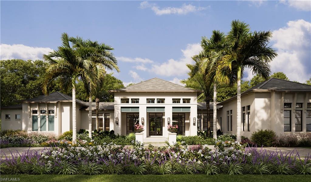 6951 Verde Way Naples, FL 34108 - Photo 1 of 6 front view of a house with a yard