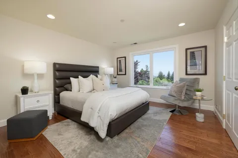 a bed room with a bed and a couch