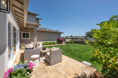 a view of yard with outdoor seating