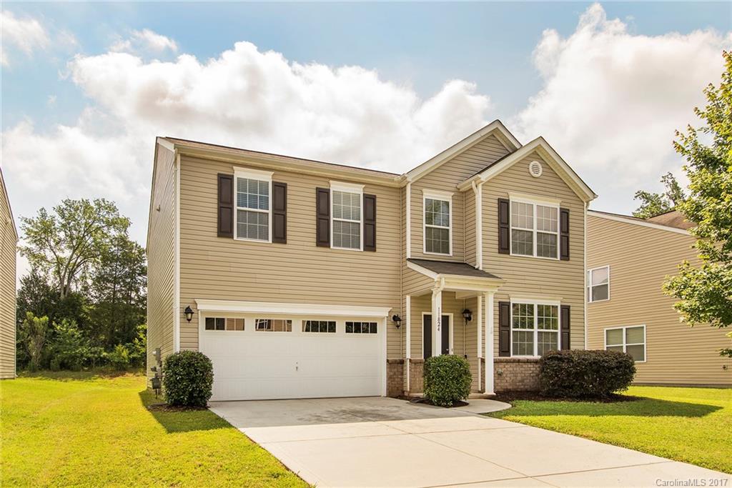 11824 Bending Branch Road Charlotte, NC 28227 - Photo 2 of 23 a front view of a house with garden