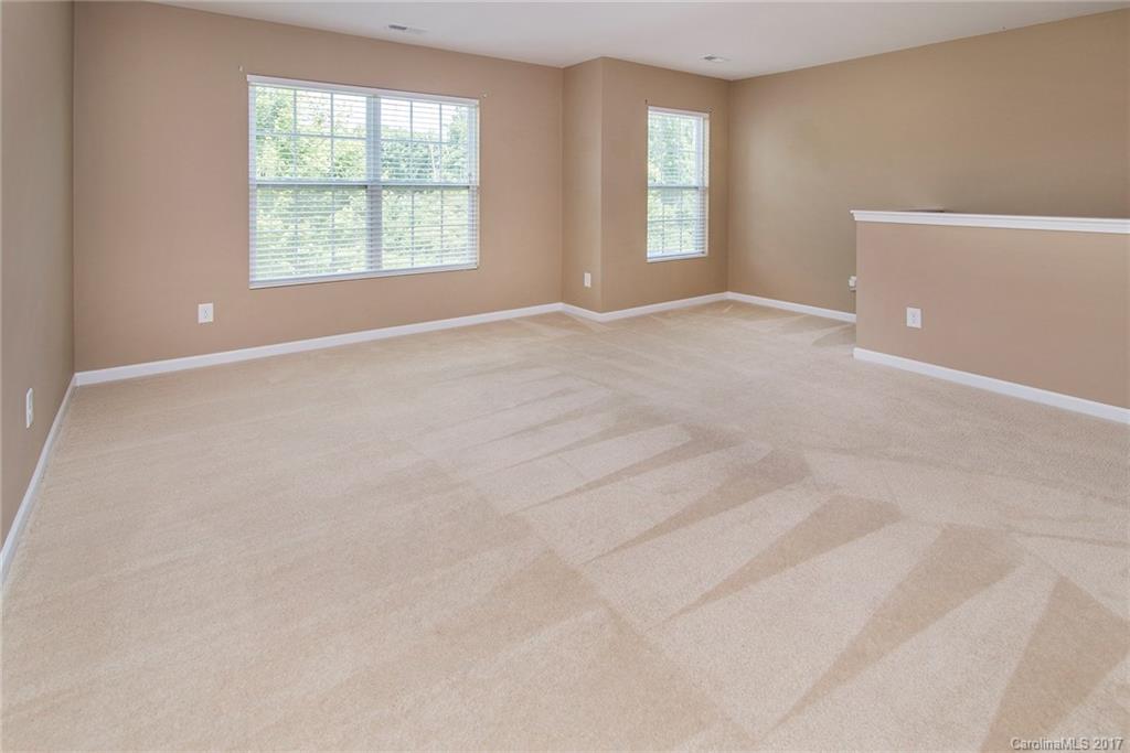 11824 Bending Branch Road Charlotte, NC 28227 - Photo 13 of 23 an empty room with windows