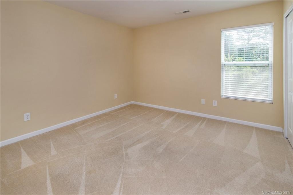 11824 Bending Branch Road Charlotte, NC 28227 - Photo 18 of 23 an empty room with a window