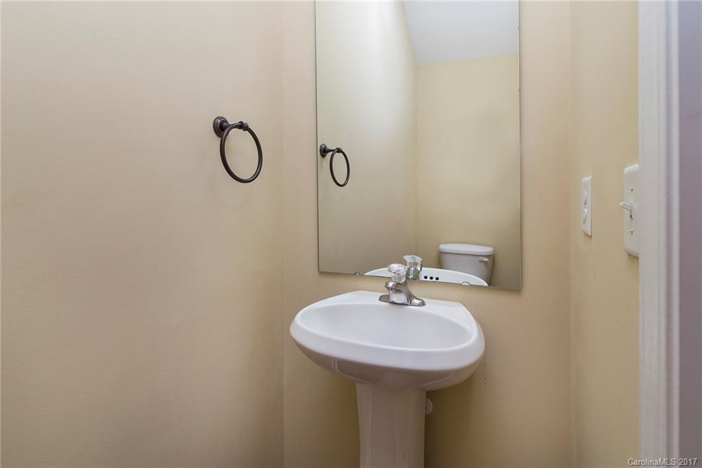 11824 Bending Branch Road Charlotte, NC 28227 - Photo 10 of 23 a bathroom with a sink and mirror