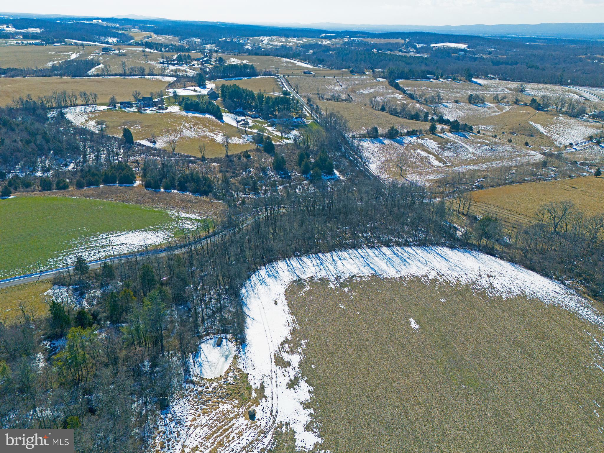 Muth Road Woodsboro, MD 21798 - Photo 4 of 10 an aerial view of residential houses with outdoor space and river