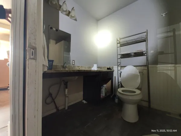 a bathroom with a sink and a toilet