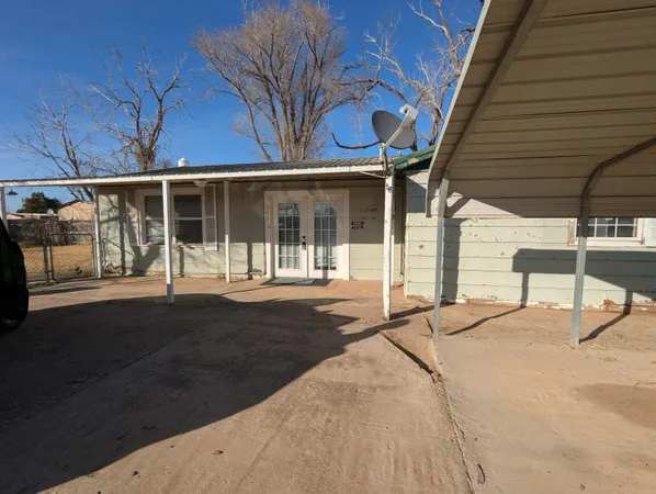 a house with yard in front of it
