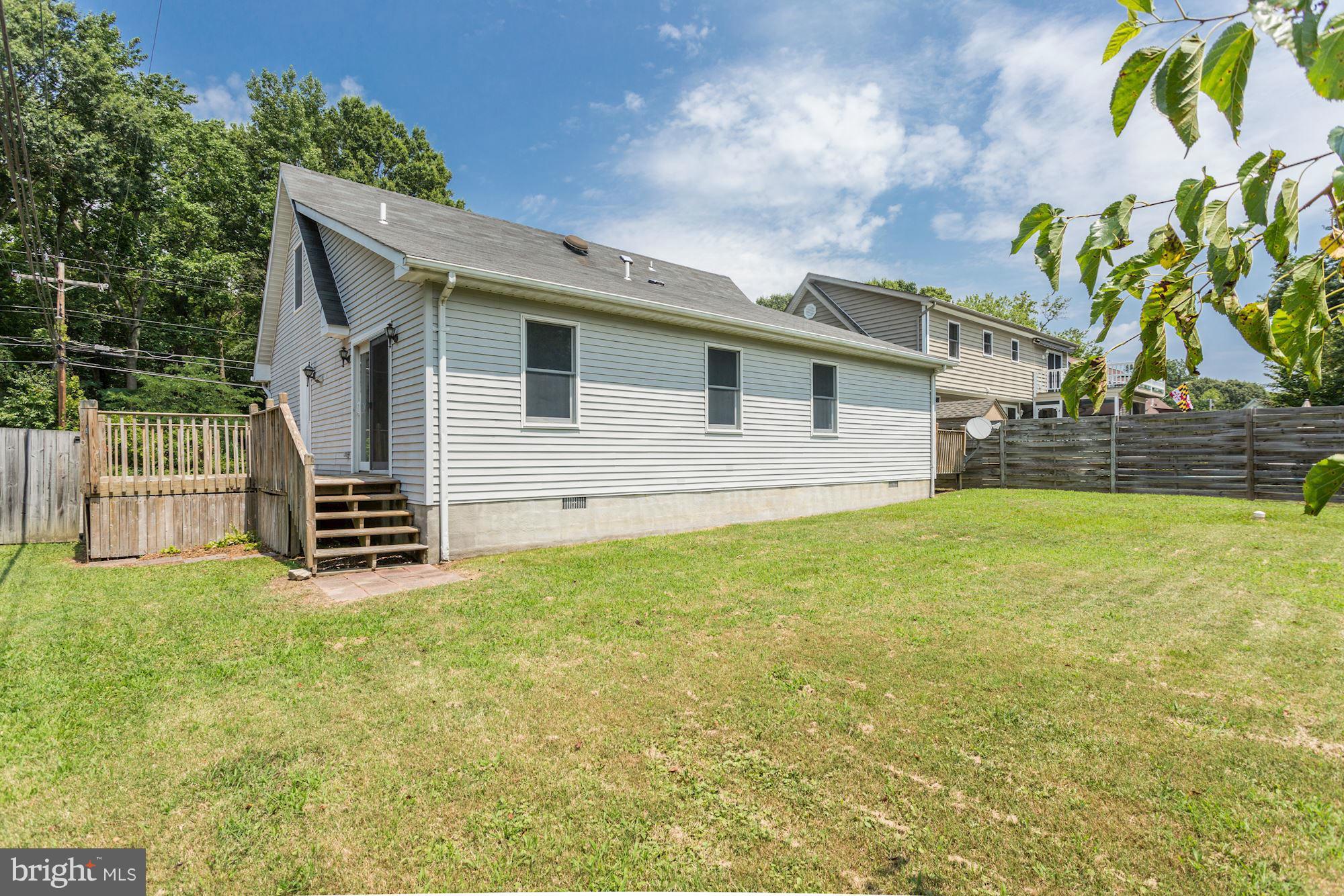 1201 Steamboat Road Shady Side, MD 20764 - Photo 20 of 27 large fully fenced back yard with storage shed