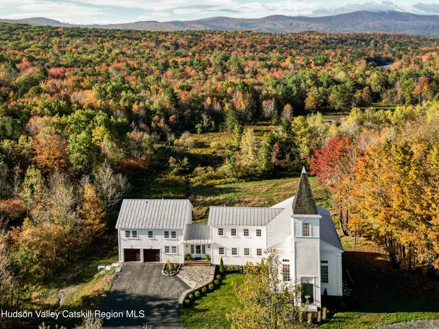 an aerial view of residential building with parking space