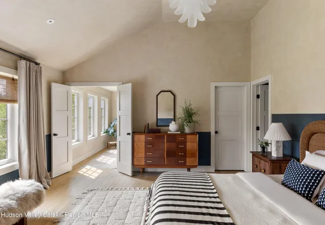 a view of a yard with swimming pool and green space